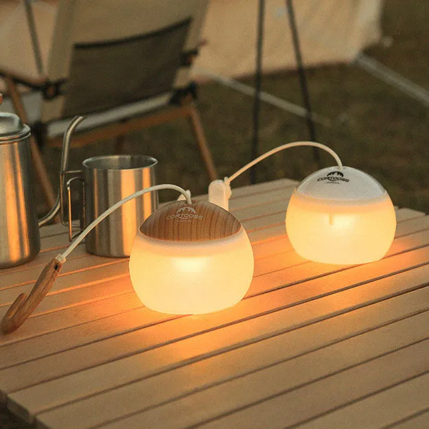 Modern, minimalist, hanging USB rechargeable LED camping tent light for outdoor use