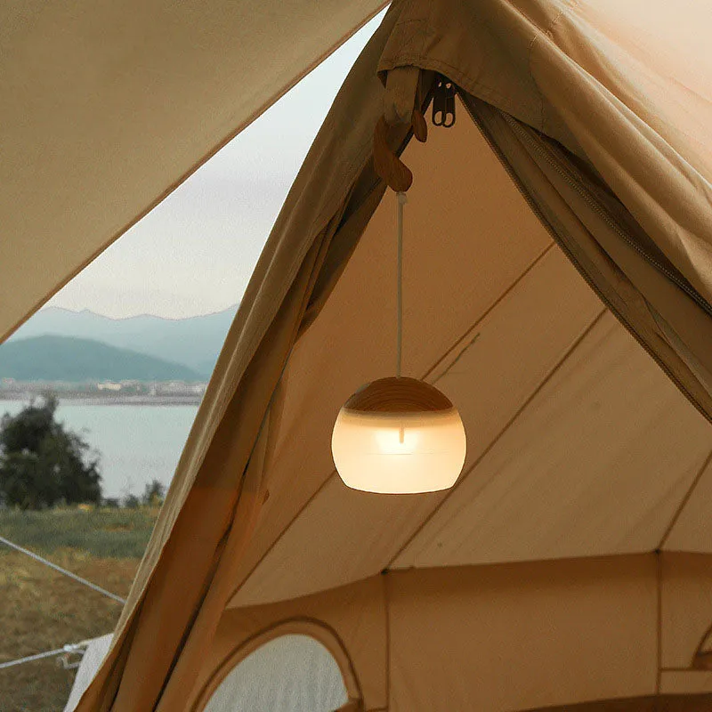 Modern, minimalist, hanging USB rechargeable LED camping tent light for outdoor use